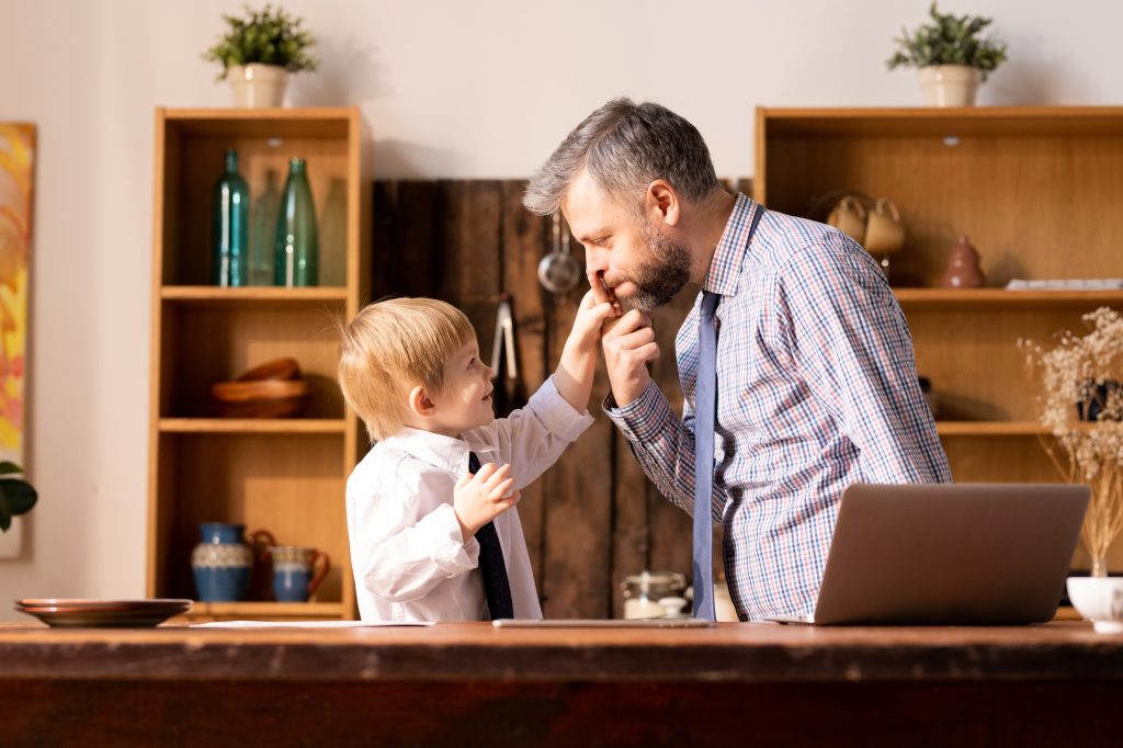 Funny father and son doing role-playing game